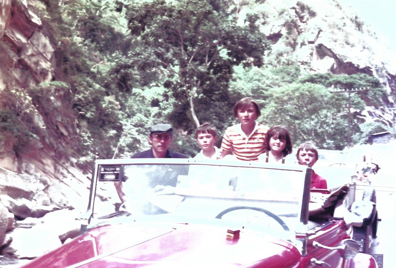 Peter and his family with classic cars