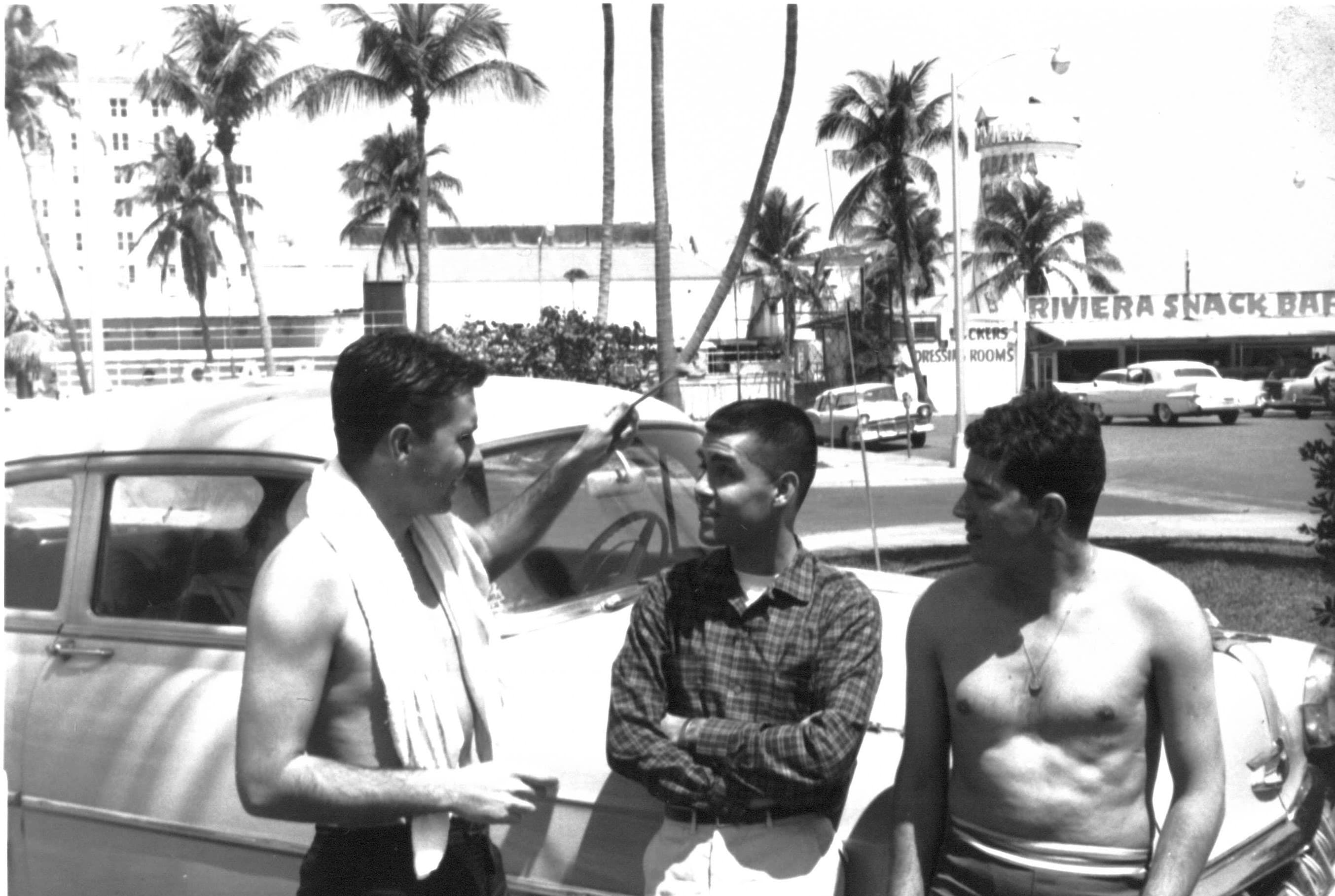 Peter and his family with classic cars