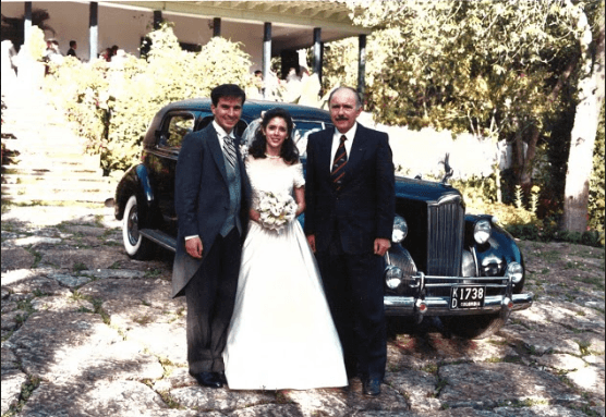 Peter and his family with classic cars