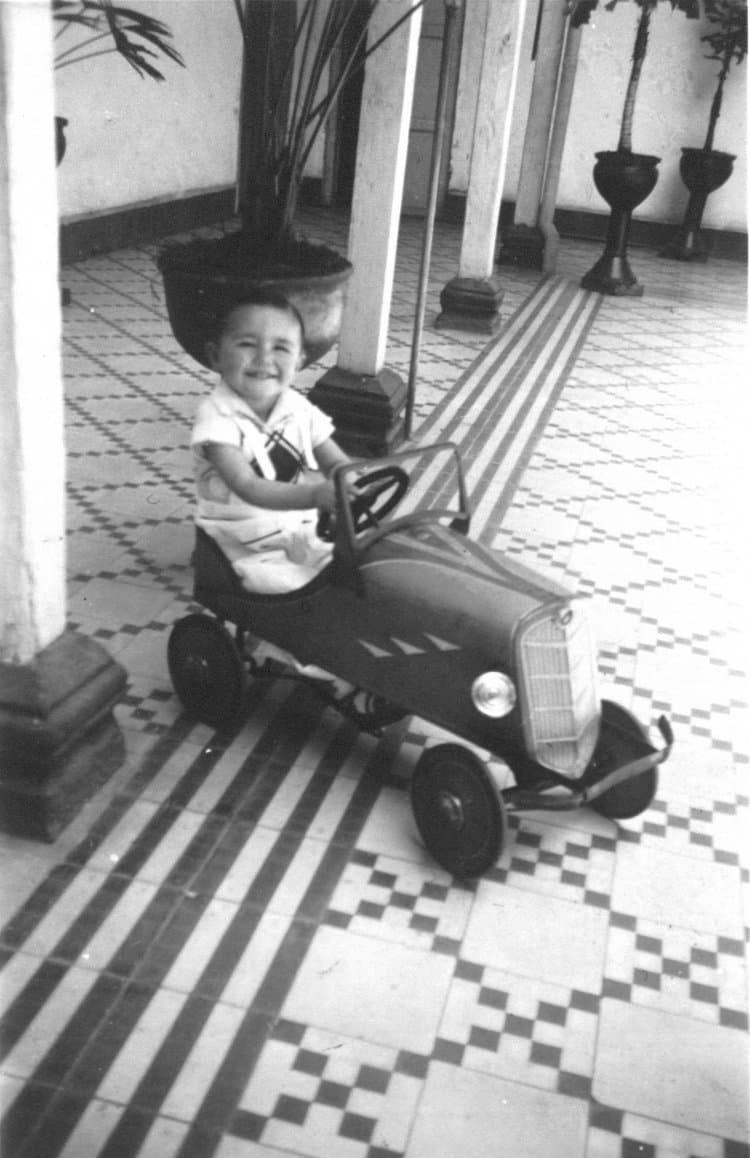 Peter and his family with classic cars
